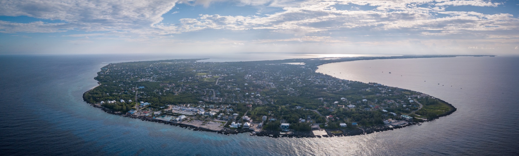 Aerial view of a Cayman island coastline and sea.